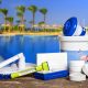 Equipment with chemical cleaning products and tools for the maintenance of the swimming pool.
