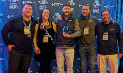 Keith Smith (Center) this year's winner of the Pentair Pool Pro Award