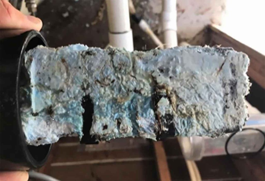 Education for Pool Pros: Improper water balance caused scale on salt chlorine generator cell plates 