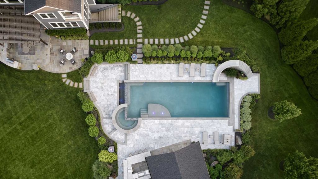 Aerial view of a unique Pac-Man style three quarter spa